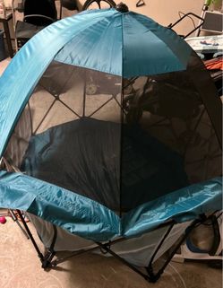 Regalo My Play Deluxe 8-Panel Portable Play Yard with the attachable canopy, in teal