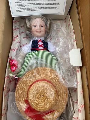 Shirley Temple "Captain January" porcelain doll by The Danbury Mint, still in its original packaging