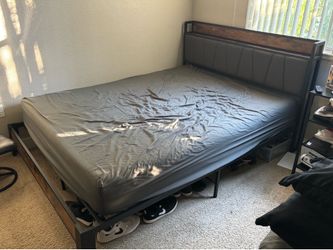 Metal Queen bedframe.