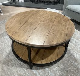 Rustic Round Coffee Table with Storage Shelf – $100