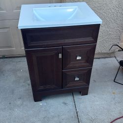 24”  BROWN RESTROOM VANITY  WHITE  TOP NEW