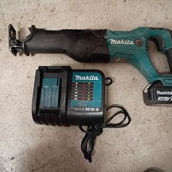 Makita Saw/Battery/Charger