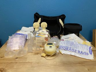 Medela Freestyle Breast Pump With Accesories