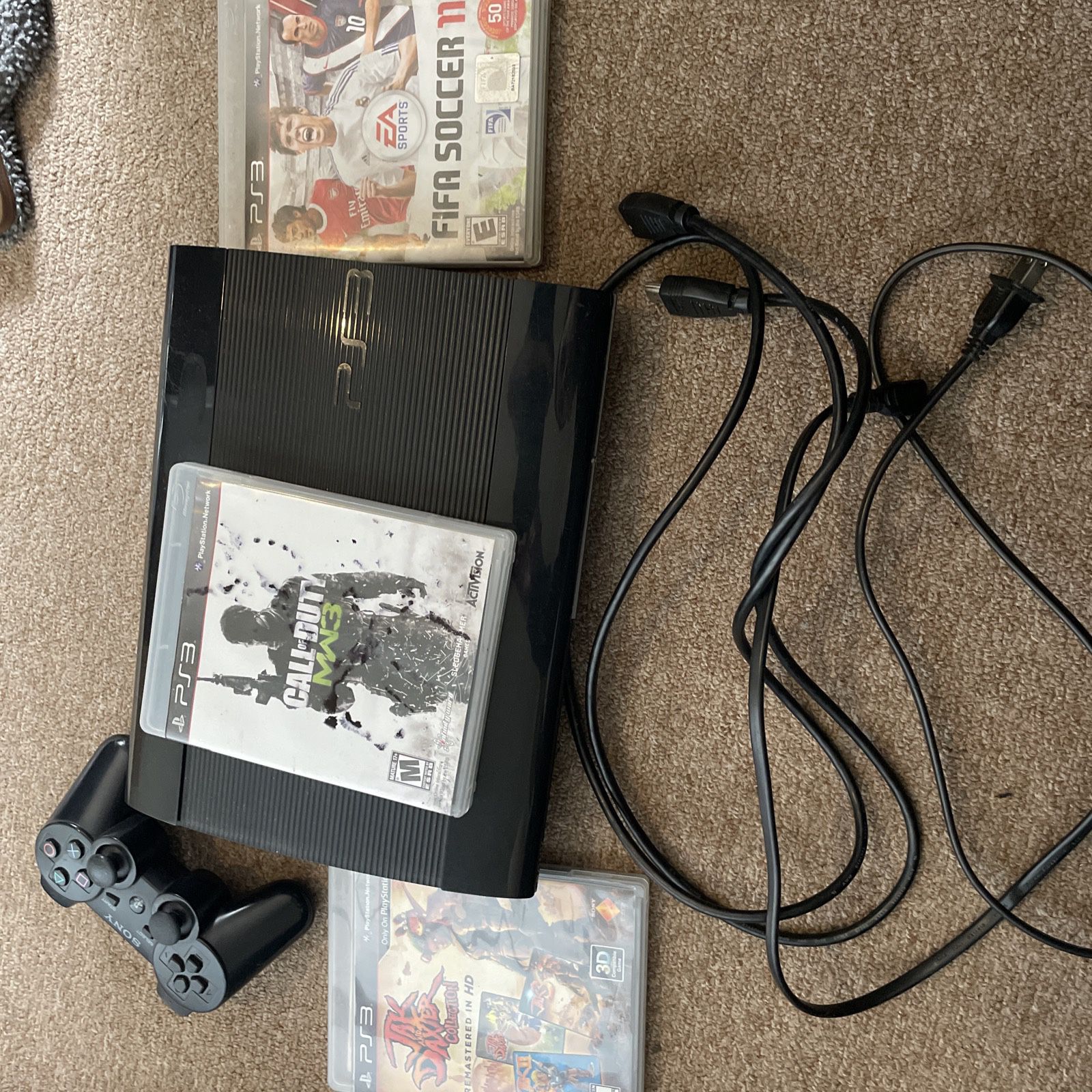 PS3 With 4 Games And A Controller 