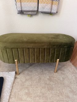 Olive green velvet storage ottoman