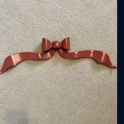 22” wood painted hanging bow