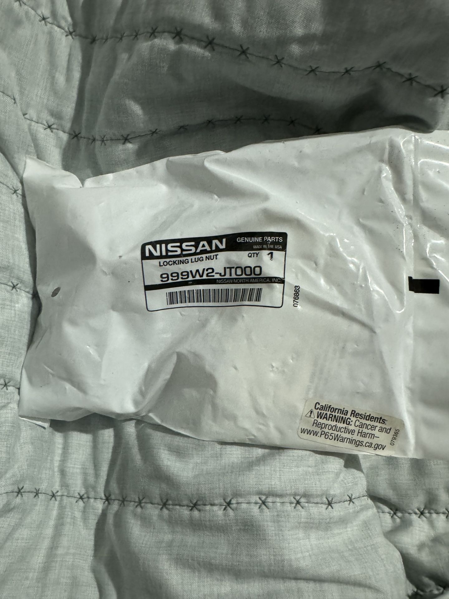 Nissan Locking Lug Nuts OEM sealed Bag