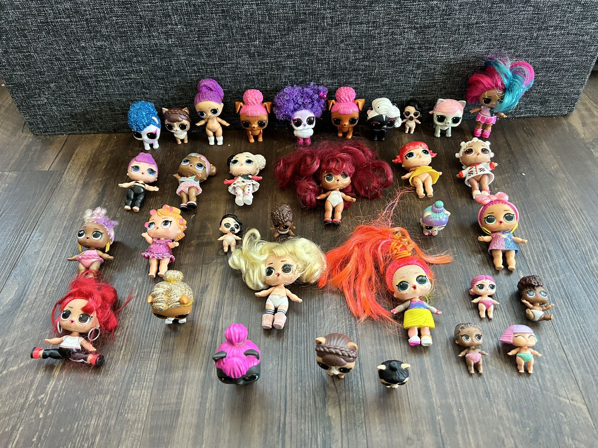 Collection of 33 LOL Surprise Dolls