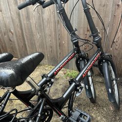 2 Folding Bikes With Carrying Bags. 