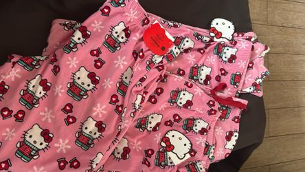Hello Kitty Christmas Pajama Pants. L,M. $25 Each.