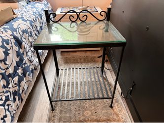 Wrought iron side table with glass top