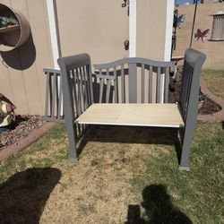 small gray crib bed frame and mattress 
