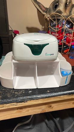 Wipe warmer and diaper caddy