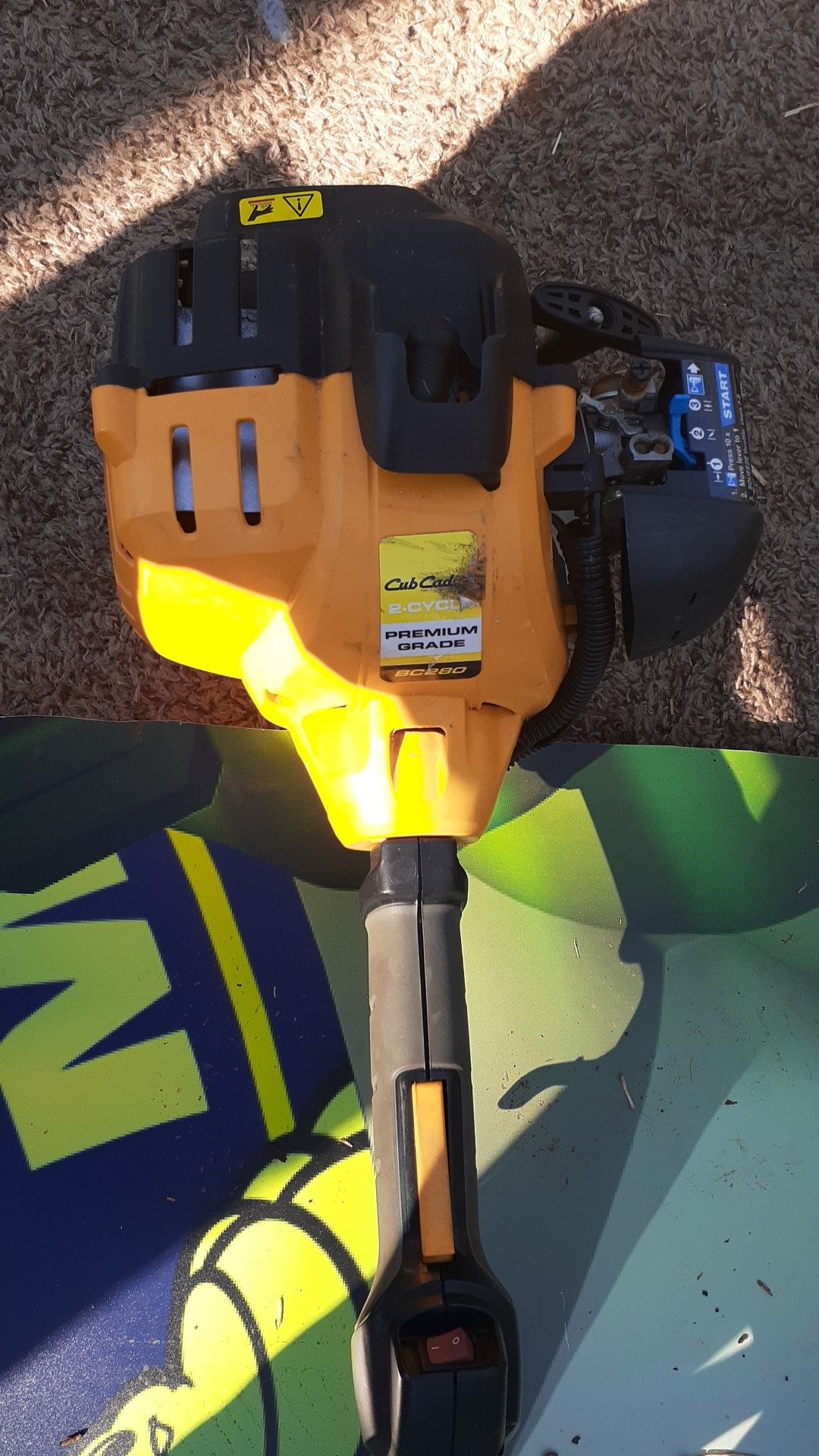 Cub Cadet weed trimmer and saw head