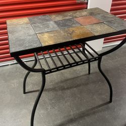 2 Stone tile tables with metal bas