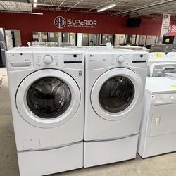 LG WASHER AND DRYER ON PEDESTALS
