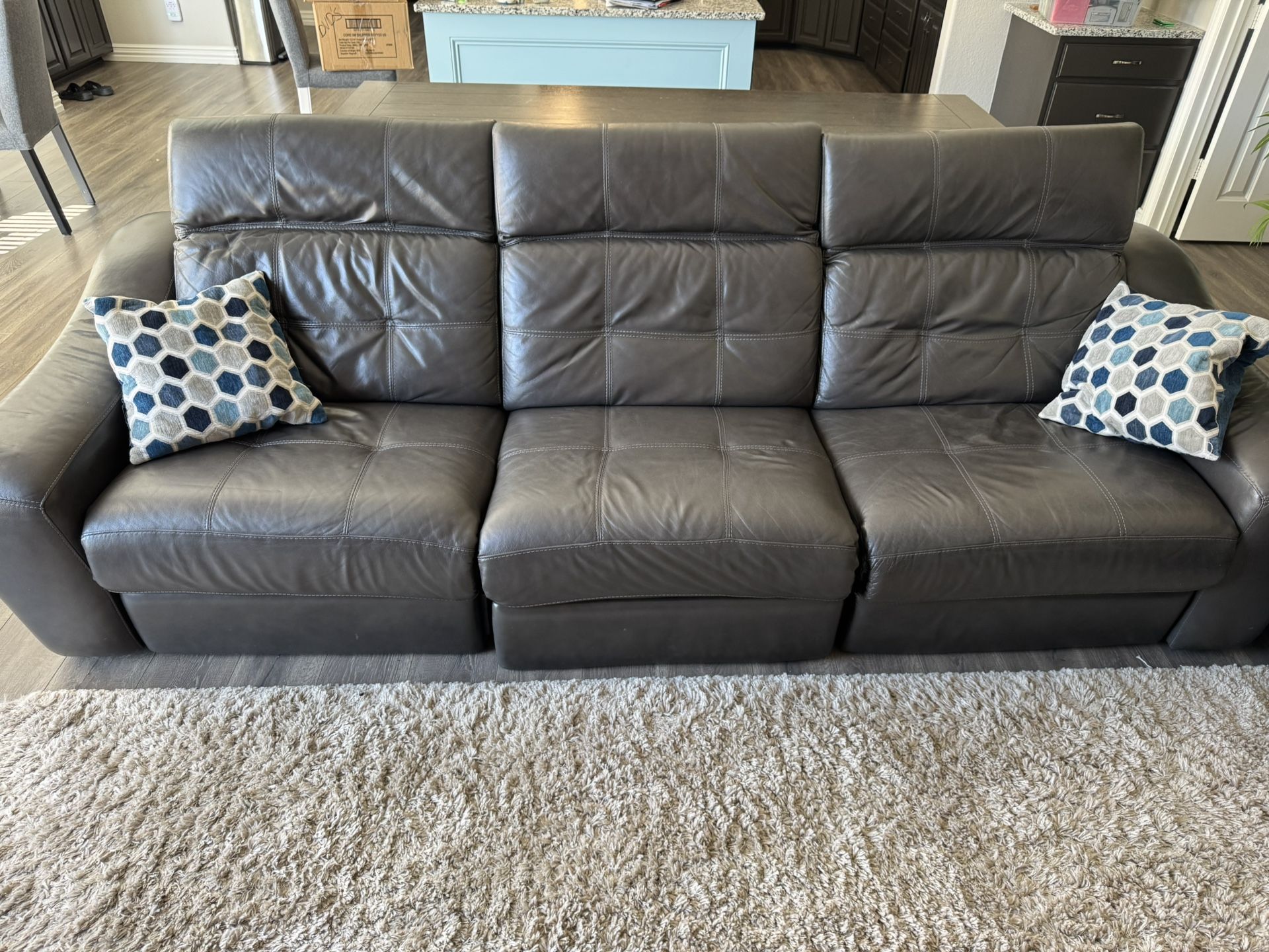 Gray Leather Reclining Couches. Sofa And love. Motorized.