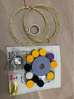 Tennis rackets over grips