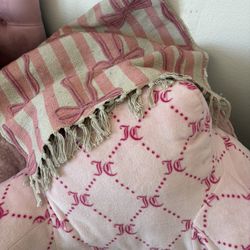 pink bow rug , and juicy couture pillow 