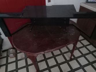 Gloss jet black TV stand with glass shelf , entertainment center $25