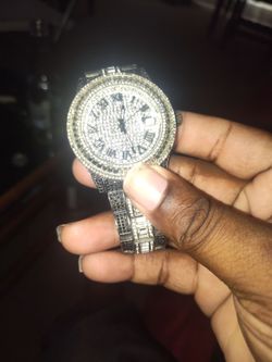 Hey my name Kenny I'm selling my diamond watch