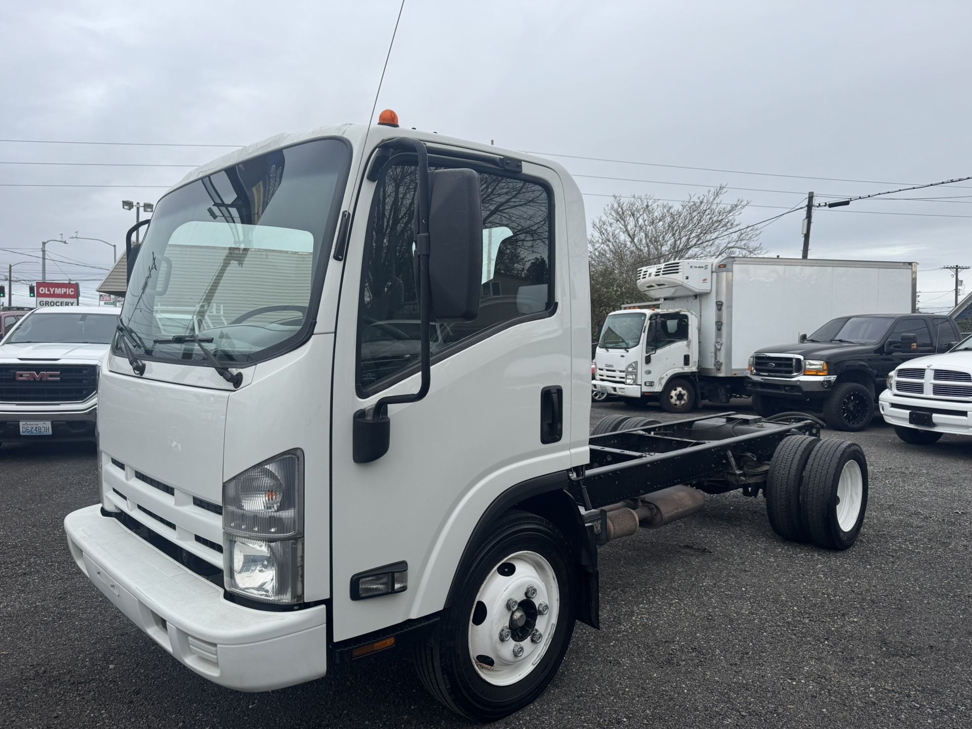 2014 Isuzu Med Duty NPR NPR Regular Cab Gas 101k miles 12 foot frame will fit a 12 to 14 foot flatbed dump box or box  Runs and drives excellent low m