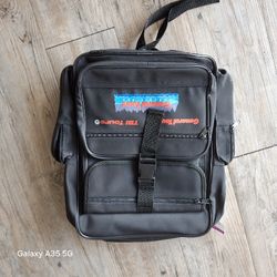 Versatile Black "TBI Tours / General Tour" Backpack with Multiple Pockets