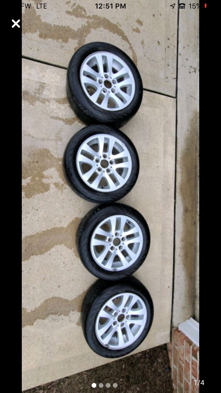 2007 BMW OEM ALLOYS WHEELS 16” with tires at 35% usage.