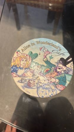Old Alice in wonderland’s cup coasters