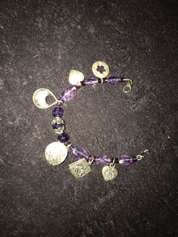 Amethyst bracelet with hill tribe silver charms