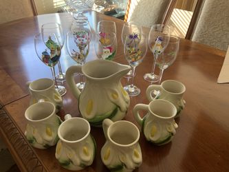 Pier 1 hand painted Christmas wine glasses and 7 piece pitcher