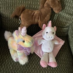 Two unicorns and a horse stuffed animals