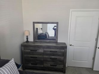Dresser with mirror and nightstand for sale.