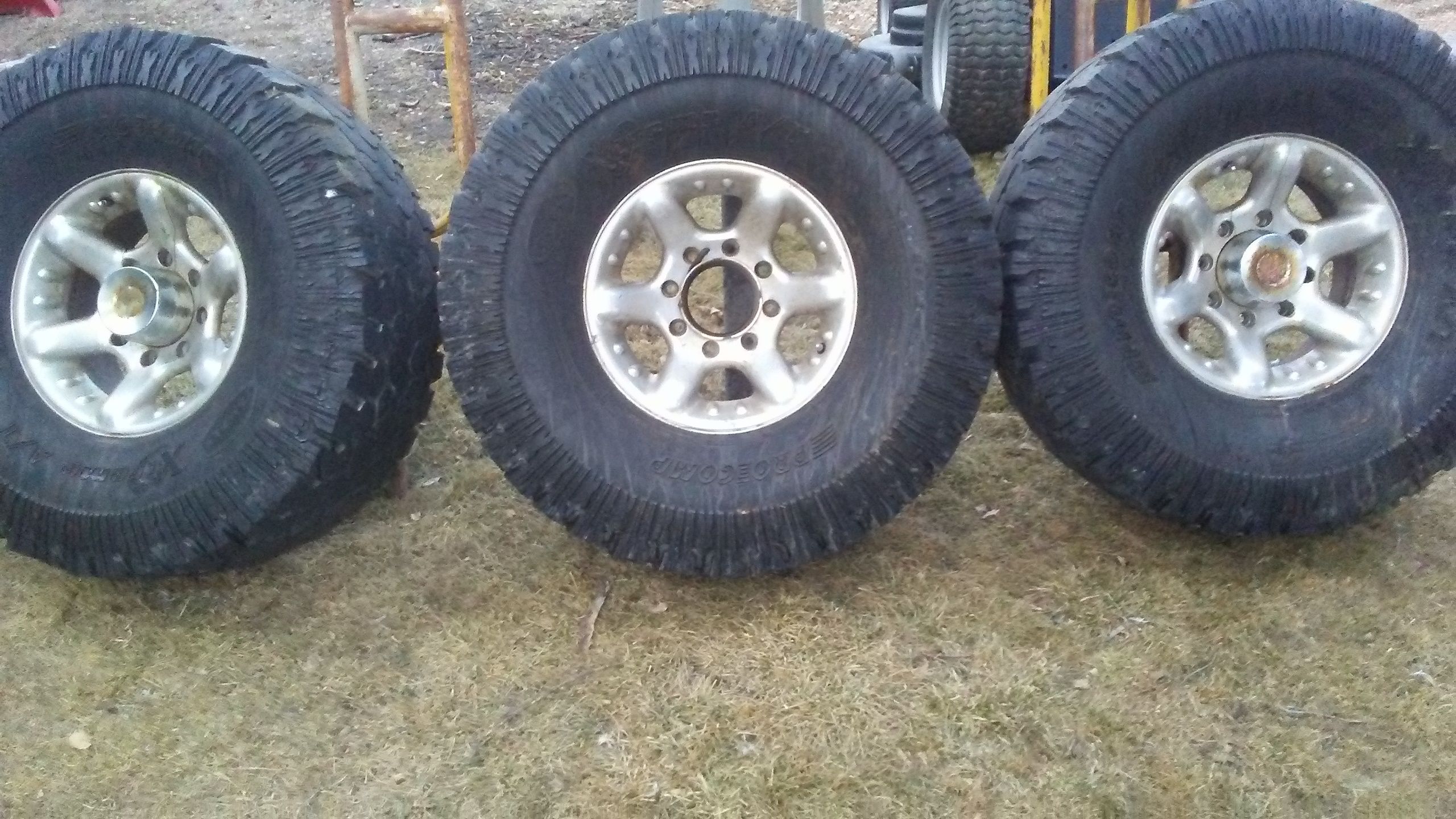 (4) " 325/80 R16" pro-comp extreme AT tires wheels