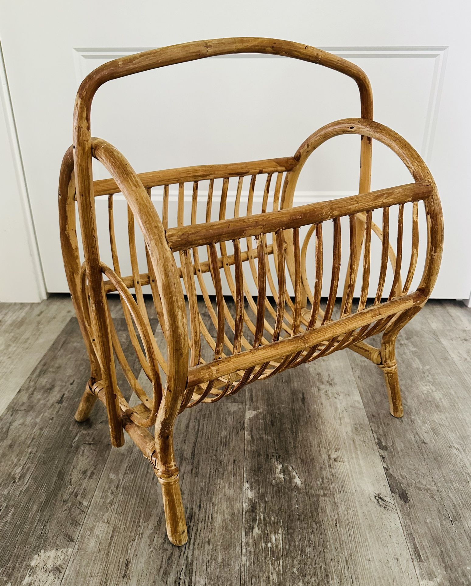 Large Vintage bamboo rattan boho magazine rack/ storage holder. 19 1/2” tall x  16” wide x 12” front to back . Nice curved design and large 