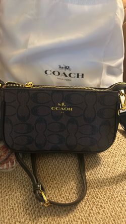 this authentic Coach purse sells for 60.00