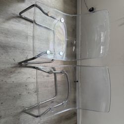 Clear Plastic & Silver Chairs 