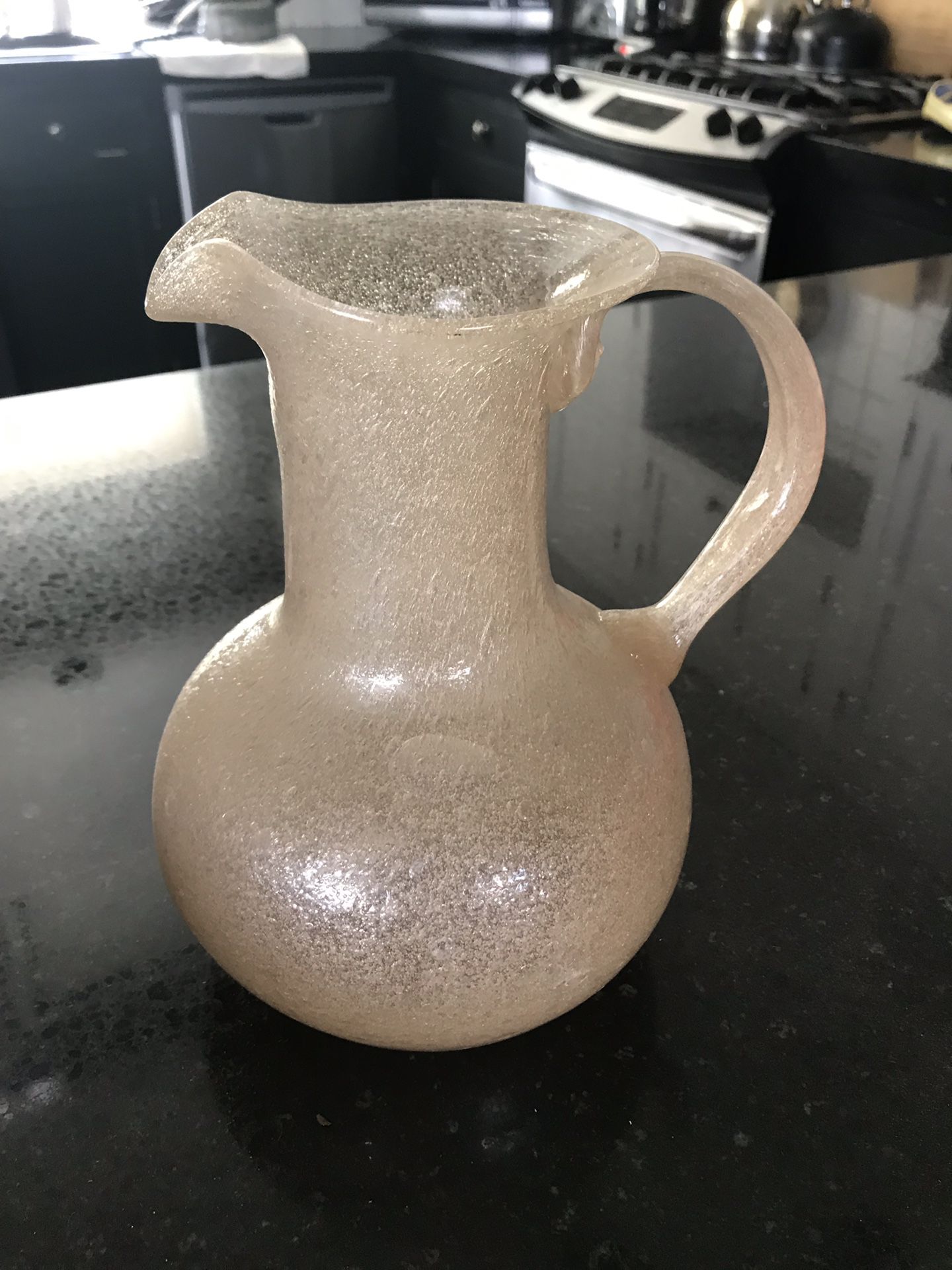 Pale pink blown glass pitcher