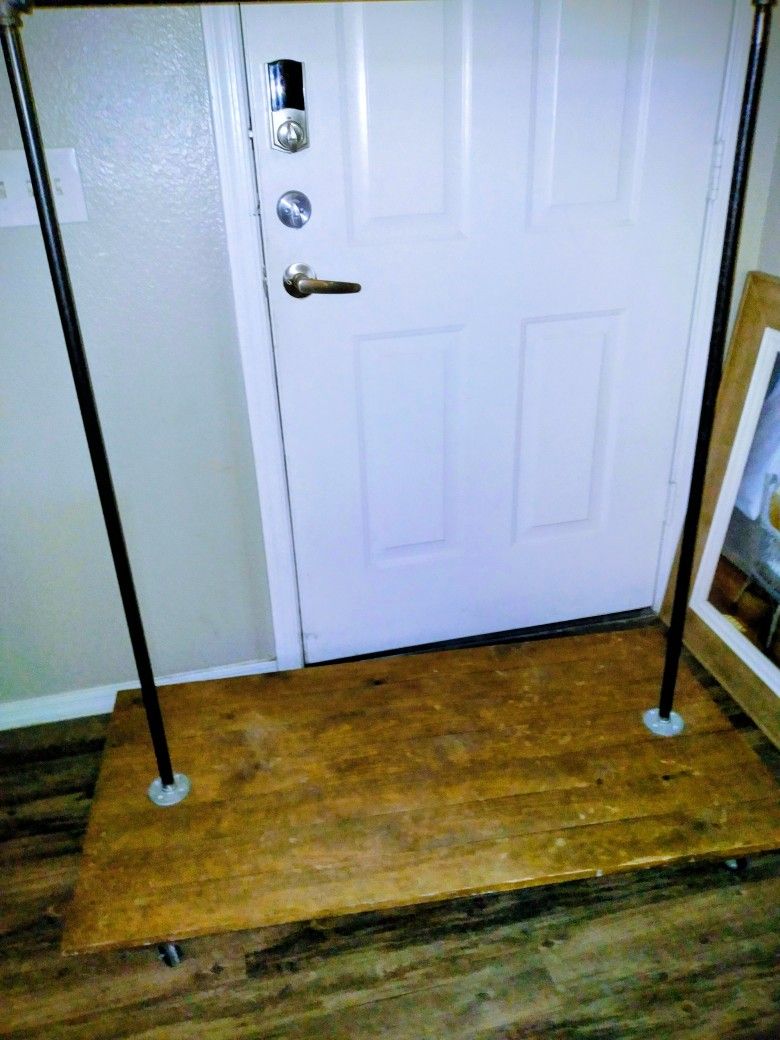 Industrial Metal Pipe Wood Base Rolling Display Garment Rack 