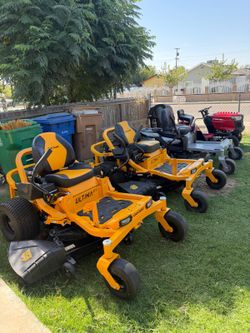 I have tractors at various price points and offer delivery anywhere. Models include a 54-inch Cub Cadet ($4,200), a 50-inch Cub Cadet ($3,650), a 42-i