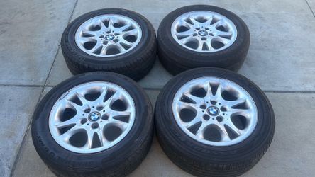 BMW X3 suv 17 Inch aluminum wheels with old tires 5x120mm