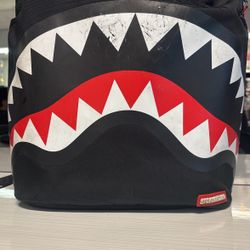 sprayground backpack red black