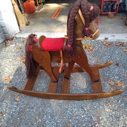 ALL. WOOD ROCKING HORSE. LEATHER   STRIUPS.  PADDED SADDLE. LEATHER. RAINS.   225.00