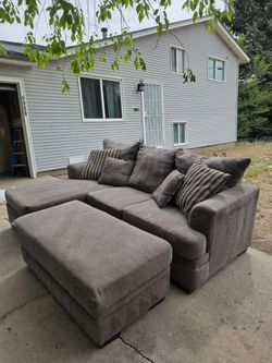 Like New Gray Reversible Sectional  & Storage Ottoman - FREE DELIVERY