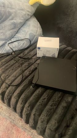 PlayStation four with power, cord and HDMI cord two cordless brand new controllers