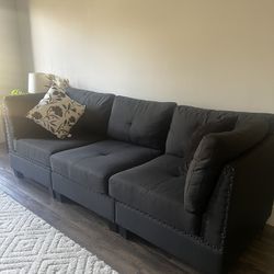 Black Sofa With Movable Ottoman 
