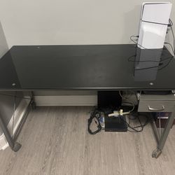 glass table with drawer and shelf