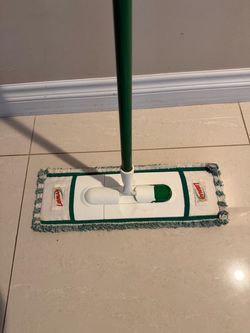 Wet and dry mop stick and used cloth , $15