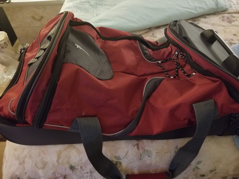 Duffel bag with wheels separate bottom for shoes has wheels cost 125 sell for 65