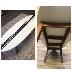 surf board coffee table Unique crate & barrel lacquered  64x22x16t. Teak wood? Some little dings 